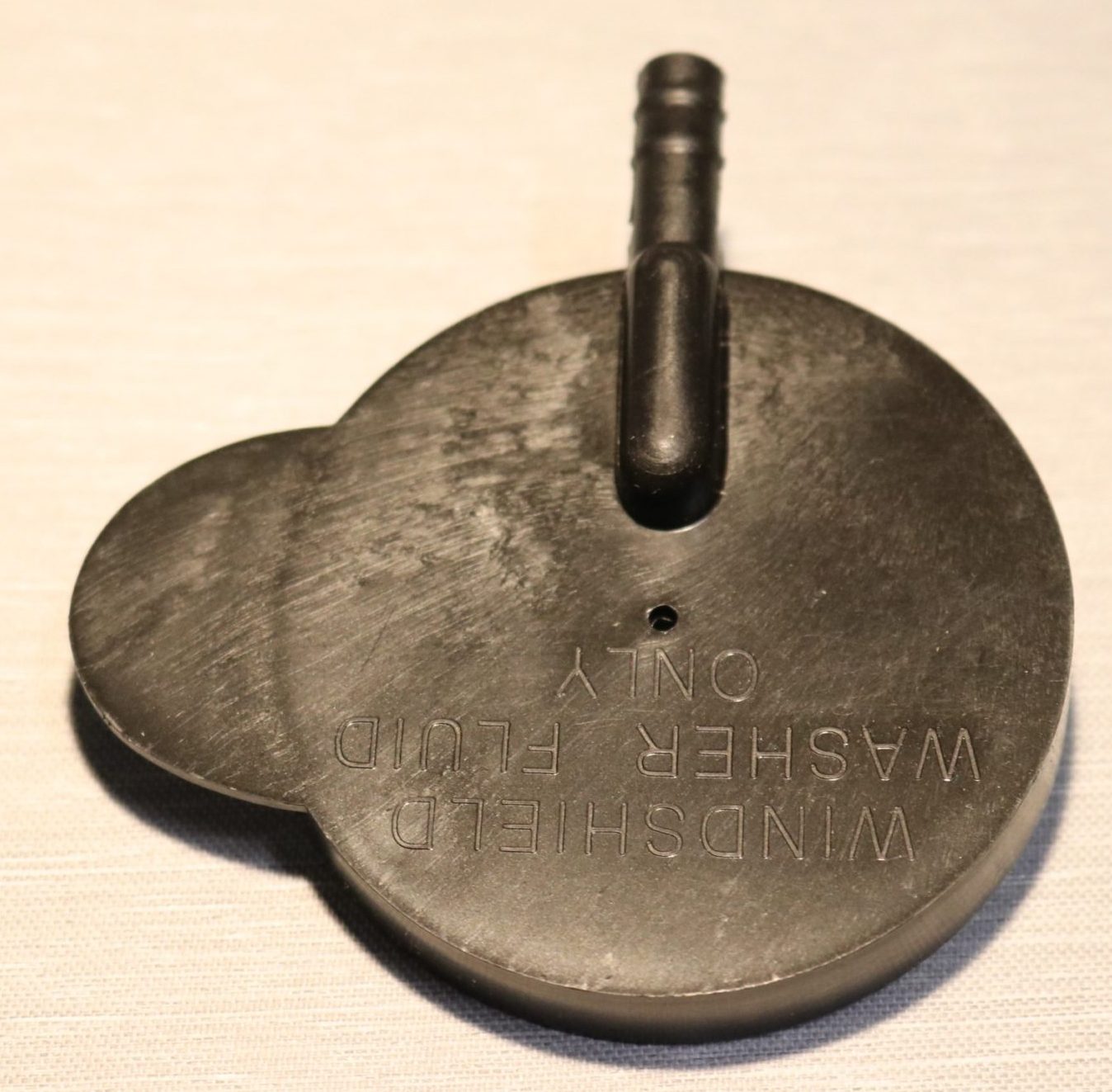 Lock till spolarbehållare